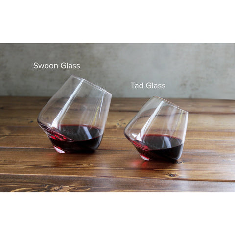 Two 5 oz handmade glasses for when you need just a tad bit.   The revolving motion aerates the liquid. Aeration, simply means exposing the liquid to air or giving it a chance to "breathe" before drinking it. The reaction between gases in the air and beverages changes the flavor.       Dishwasher Safe.  Top Rack without heated dry.